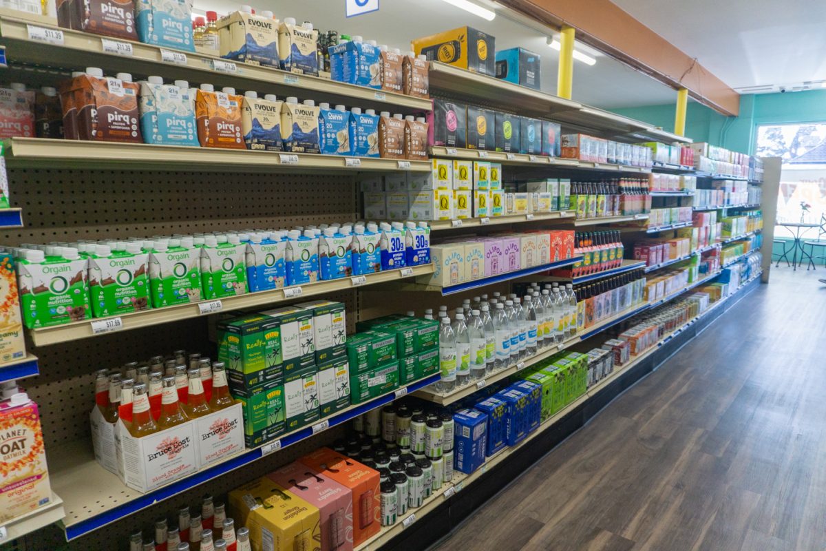 An aisle of shelves is stocked with varieties of drinks at Fort Collins Food Co-Op located at 1100 West Mountain Avenue Feb 22. The shop reclocated from 250 E Mountain Ave to expand the store's offerings and services.