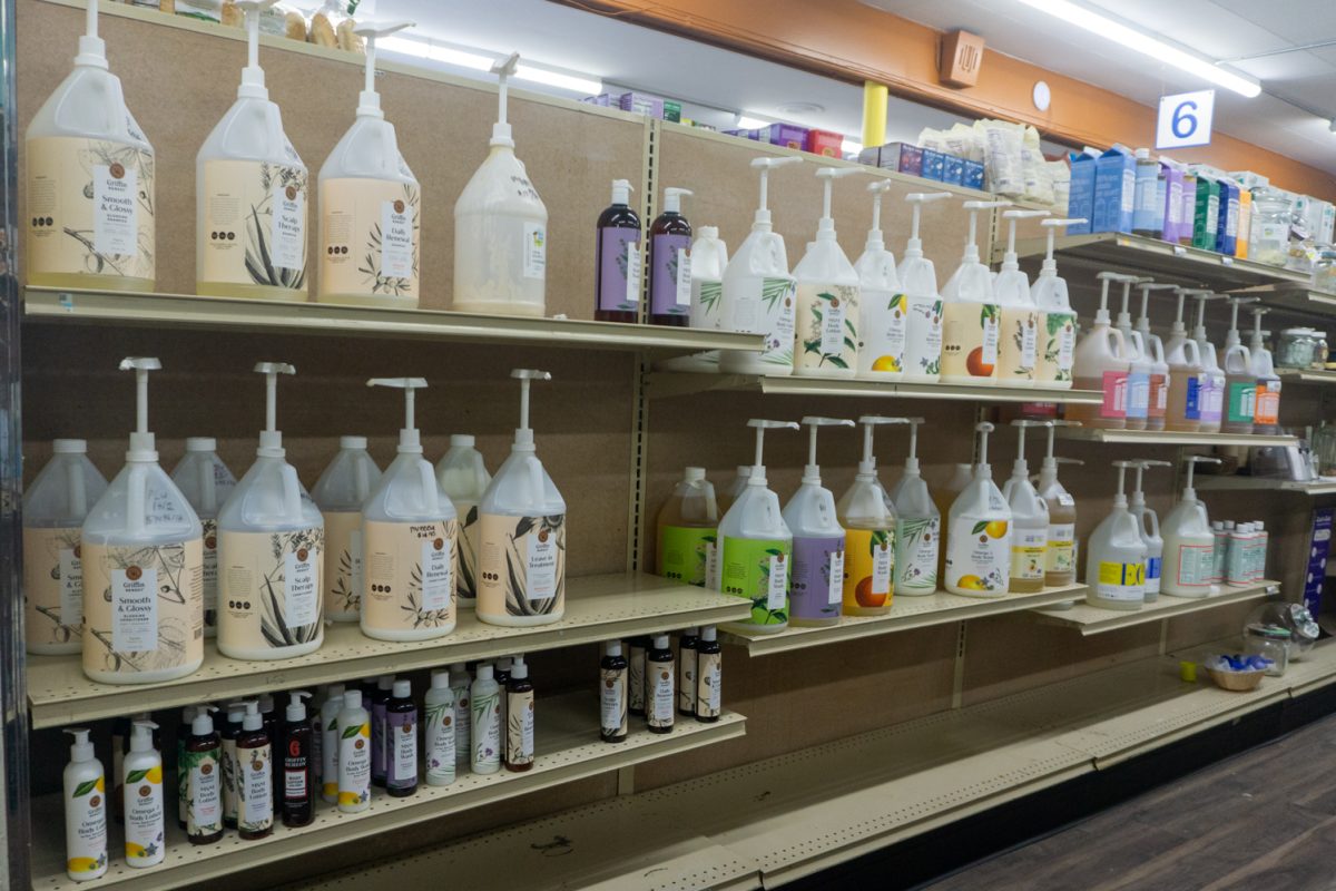 Containers of shampoo, body wash and other soaps are lined up on shelves where customers can bring and fill their own containers at the Fort Collins Food Co-Op Feb 22. The shop reclocated from 250 E Mountain Ave to expand the store's offerings and services.