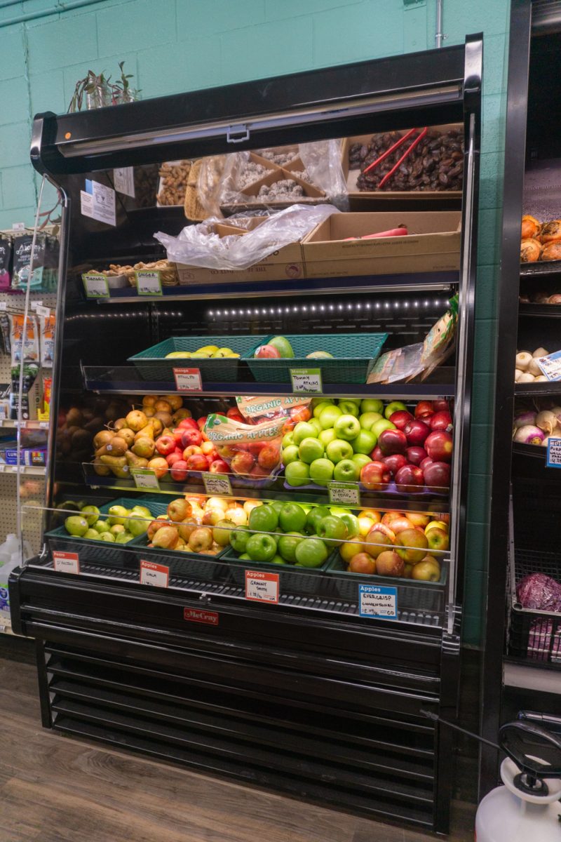 A refridgerator with fresh fruits sits in the new location of the Fort Collins Food Co-Op Feb 22. The shop reclocated from 250 E Mountain Ave to expand the store's offerings and services.