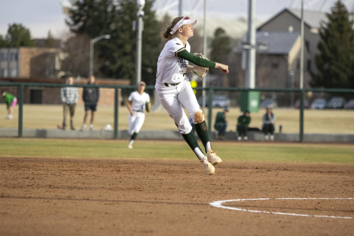 Kaylynn English (28) feilds a ball and throws it to first during game against Creighton. The Rams won 6-2 at the CSU softball field on Feb. 28.