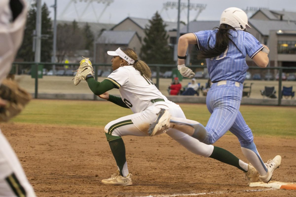 Jailey Wilson (10) catches a throw to first base during game against Creighton. The Rams won 6-2 at the CSU softball field on Feb. 28.