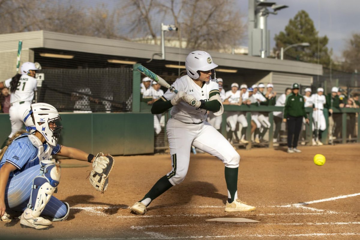Bradie Poteet-Herrera (20) hits the ball during game against Creighton. The Rams won 6-2 at the CSU softball field on Feb. 28.