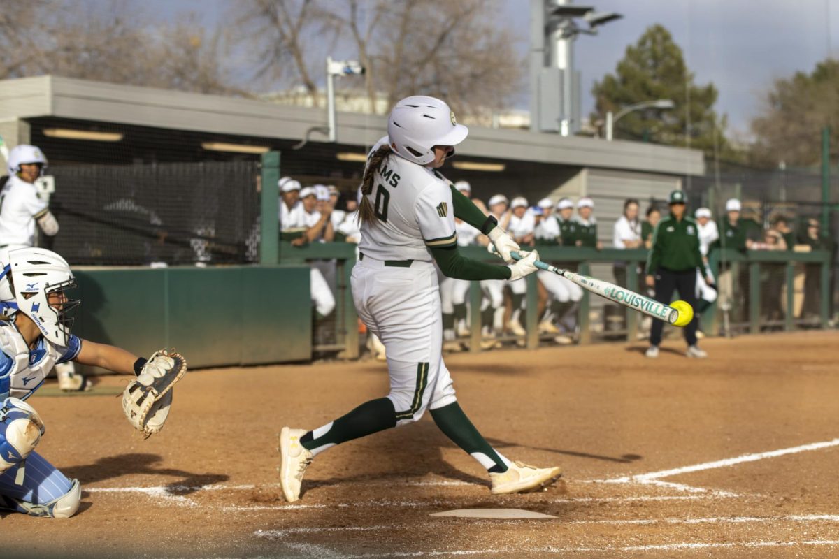Kaylynn English (28) feilds a ball and throws it to first during game against Creighton. The Rams won 6-2 at the CSU softball field on Feb. 28.