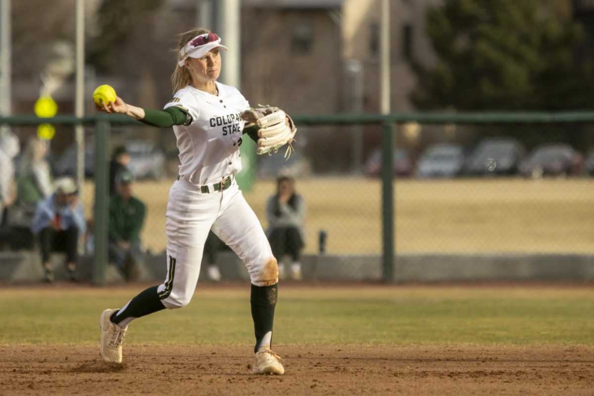 Kaylynn English (28) feilds a ball and throws it to first during game against Creighton. The Rams won 6-2 at the CSU softball field on Feb. 28.
