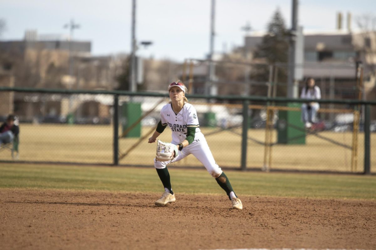 Kaylynn English (28) feilds a ball during game against UNC. The Rams won 5-1 at the CSU softball field on Feb. 28.