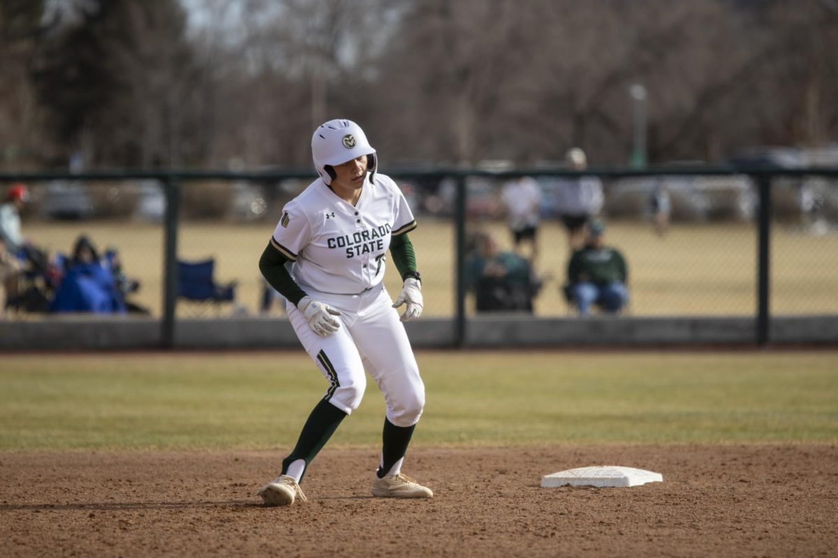 Bradie Poteet-Herrera (20) leads off of second base during game against UNC. The Rams won 5-1 at the CSU softball field on Feb. 28.