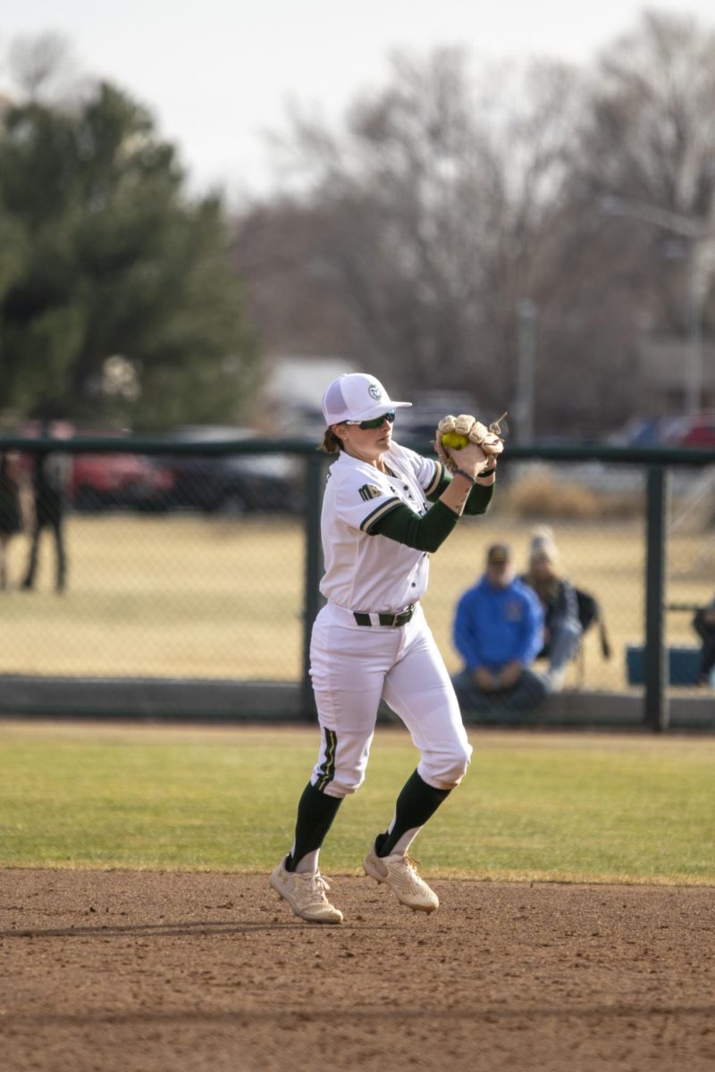 Jac Smith (2) throws the ball to first base during game against UNC. The Rams won 5-1 at the CSU softball field on Feb. 28.