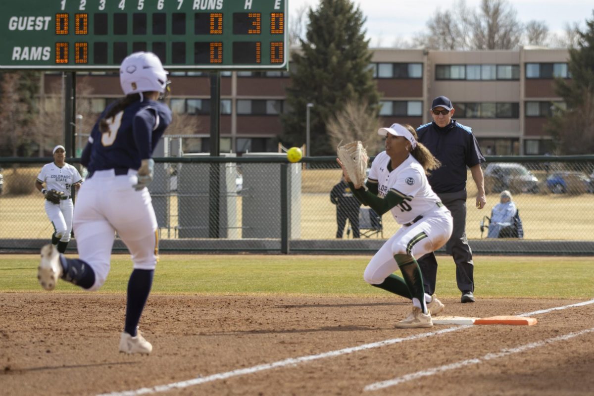 First Base Jailey Wilson (10) catches a throw from her teammates to complete an out during Colorado State University's game against Northern Colorado. The Rams won 5-1 Feb. 28.