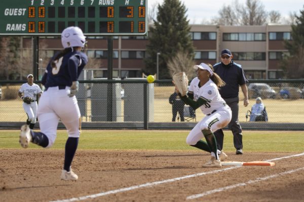 First Base Jailey Wilson (10) catches a throw from her teammates to complete an out during Colorado State University's game against Northern Colorado. The Rams won 5-1 Feb. 28.