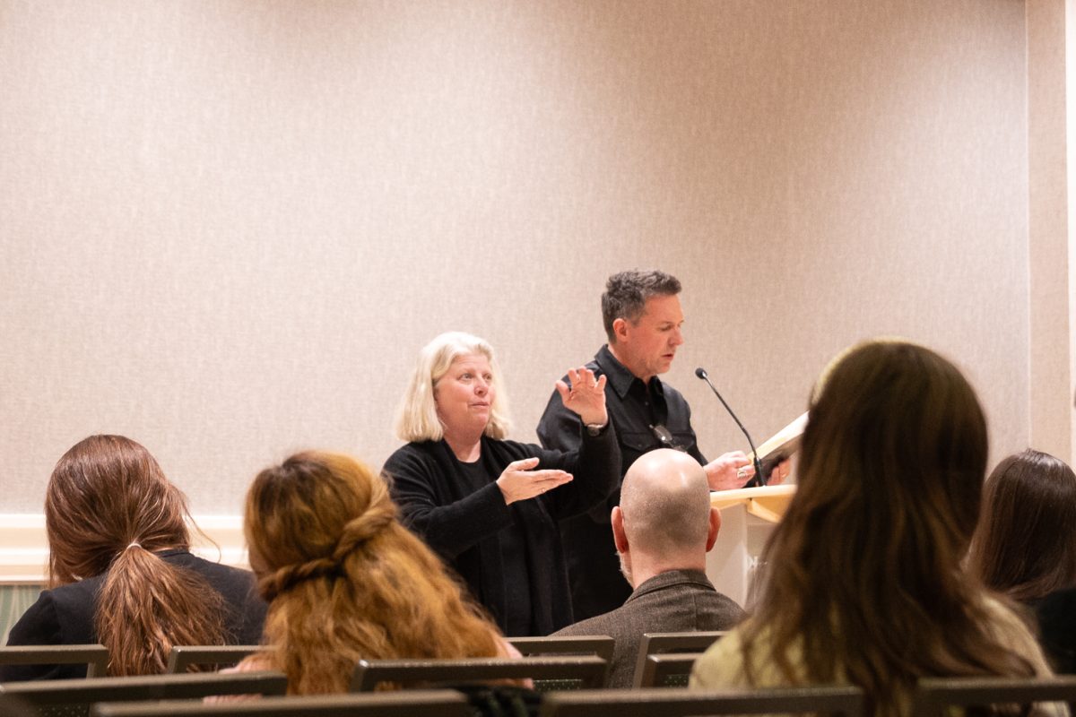 Poetry Writer Dale Martin shares some of his poetry during the Creative Writing Reading  Series at the Lory Center University Ballroom Feb. 19. 