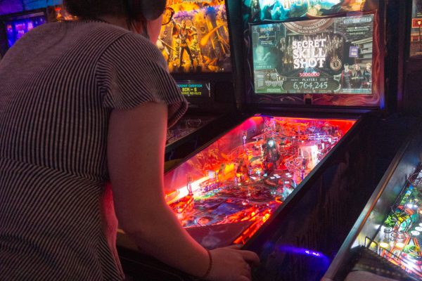 Savannah Brown plays the Harry Potter pinball game with the Women, Trans and Femme league at Pinball Jones Feb. 12. 