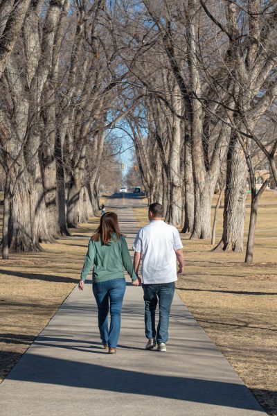 Matt and Jen Hitt walk down the CSU Oval while holding hands Feb. 9.