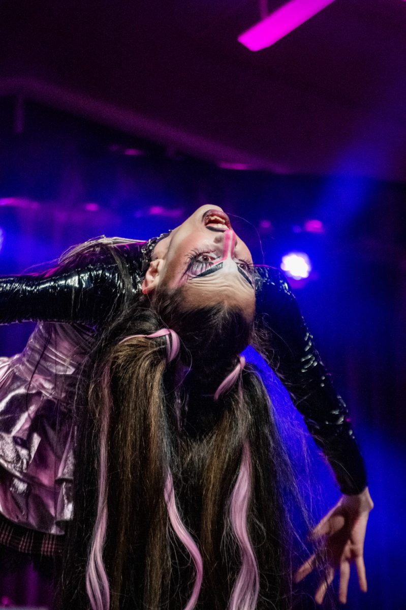 Jenna Tavia leans back during her Monster High-themed performance at the annual Colorado State University Drag Show March 29.