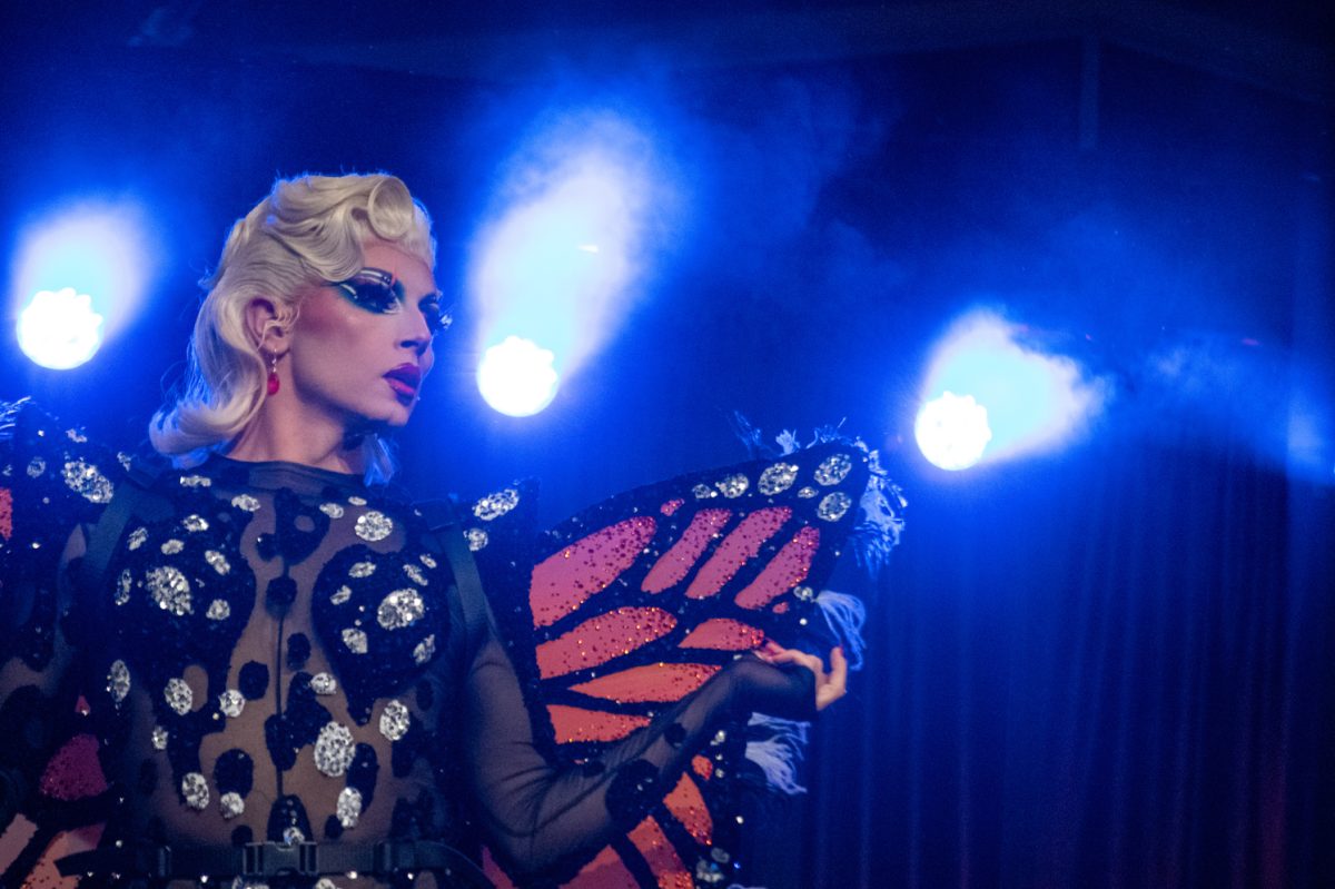 "RuPaul's Drag Race" season 18 contestant Nini Coco looks out at the audience as she performs her second number at the annual Colorado State University Drag Show March 29.