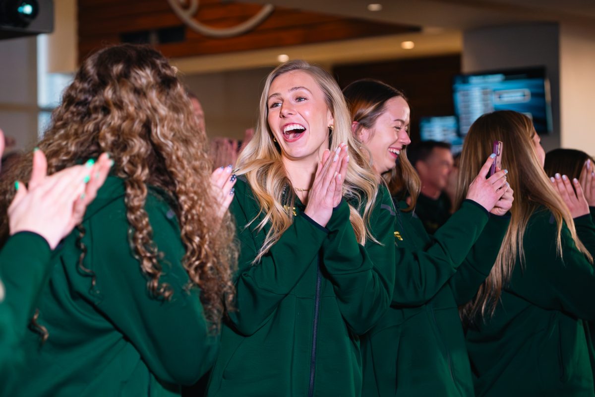Colorado State University women's basketball forward Lexi Deden (6) reacts to the announcement that the Rams have been selected as a No. 12 seed in Region 4 for the NCAA Tournament during a watch parter event in Canvas Stadium Sunday, March 15. The Rams will face No. 5 seed Michigan State in the first round of the tournament. 