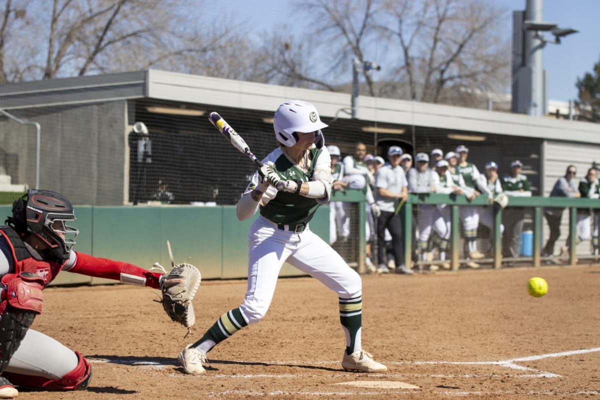 Jac Smith (2) watches a ball go by while watching during Colorado State University’s first game against University of South Dakota March 7. The Rams won 4-2 at the CSU softball field.