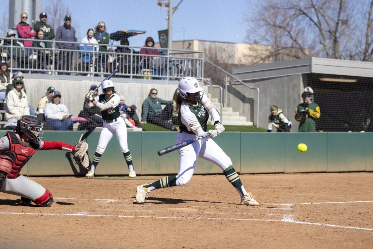 Jailey Wilson (10) hits a ball during Colorado State University’s first game against University of South Dakota March 7. The Rams won 4-2 at the CSU softball field.