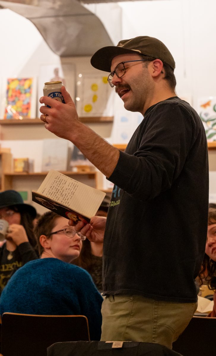 Jordan Sutton, self proclaimed poet, enjoys the Gulo Gulo collective as an expression of the community and a way to express himself. He presents to the gathered poets his piece of the night, discussing the confidence a can of beer in hand inspires. “I think it is the manifestation of a community, of a creative community that both encourages and inspires excellent art,” Sutton said. “I think that creative expression is largely something that is lacking in our modern day. And man, there were, what, 30 plus people in this room, I think, to have that consistently week in and week out is a huge gift.”