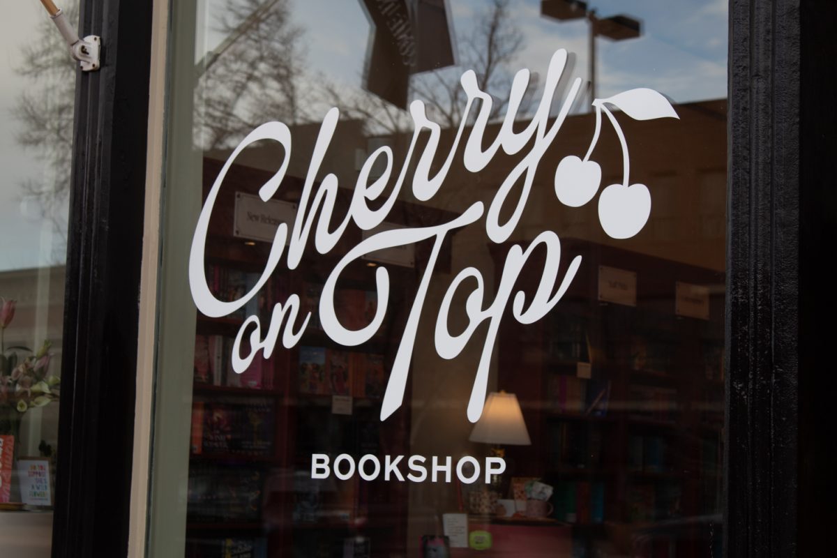 The front window of Cherry On Top, a romance-only, bookshop displays its logo and slogan, in Downtown Fort Collins Mar. 5. The shop is co-owned and run by Devon Beuret and Meredith Glover - friends, neigbors, and Fort Collins locals - and had its grand opening on February 13th of this year. “It’s a romance bookstore, so we carry romance and then a lot of the subgenres of romance. And we have a kid’s section, we have a few nonfiction books, and then obviously some retail,” Glover said.