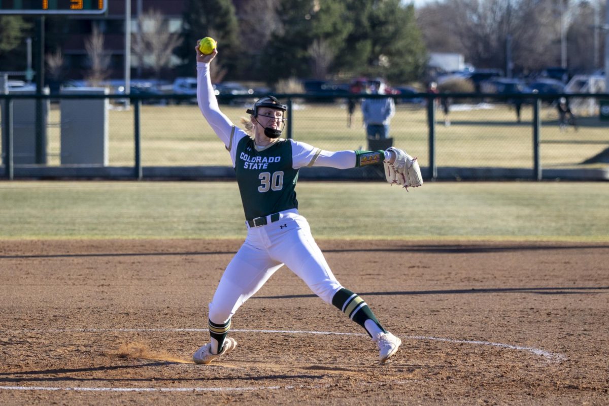 Andrea Jaskowiak (30) throws a pitch during Colorado State University’s second game against University of South Dakota March 7. The Rams lost 2-6 at the CSU softball field.