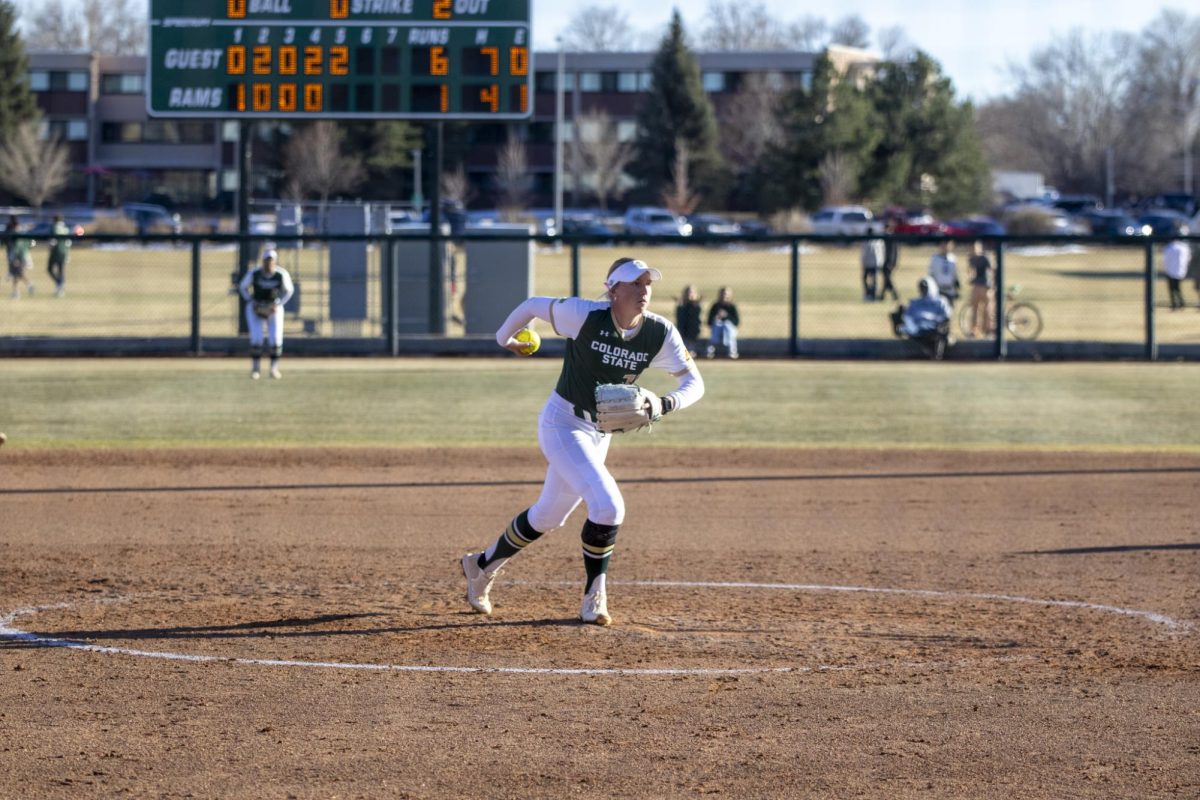 Autumn Rutherford (7) throws a pitch during Colorado State University’s second game against University of South Dakota March 7. The Rams lost 2-6 at the CSU softball field.
