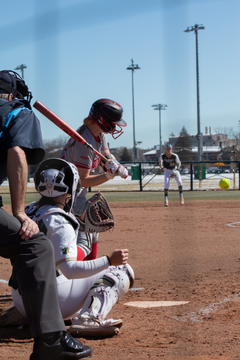 Junior Abby Edwards prepares to catch a ball during Colorado State University’s game against the University of South Dakota Mar. 3.
