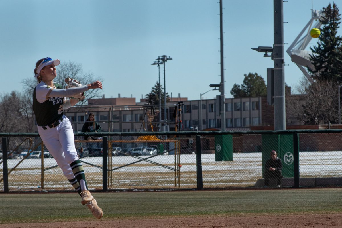 Junior Kaylynn English fields a ball and throws it during Colorado State University’s first game in a double header against the Univeristy of South Dakota Mar. 3. The Rams won 4-2 at the CSU softball feild.