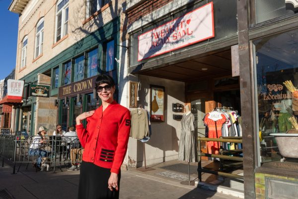 Wear It Again, Sam business owner Kim Sewald poses for a photo outside her storefront where she sells vintage clothing in Old Town March 7. “We’re like a haven for dreams, for all the cool stuff," Sewald said. "It’s like preserving, protecting and presenting history."