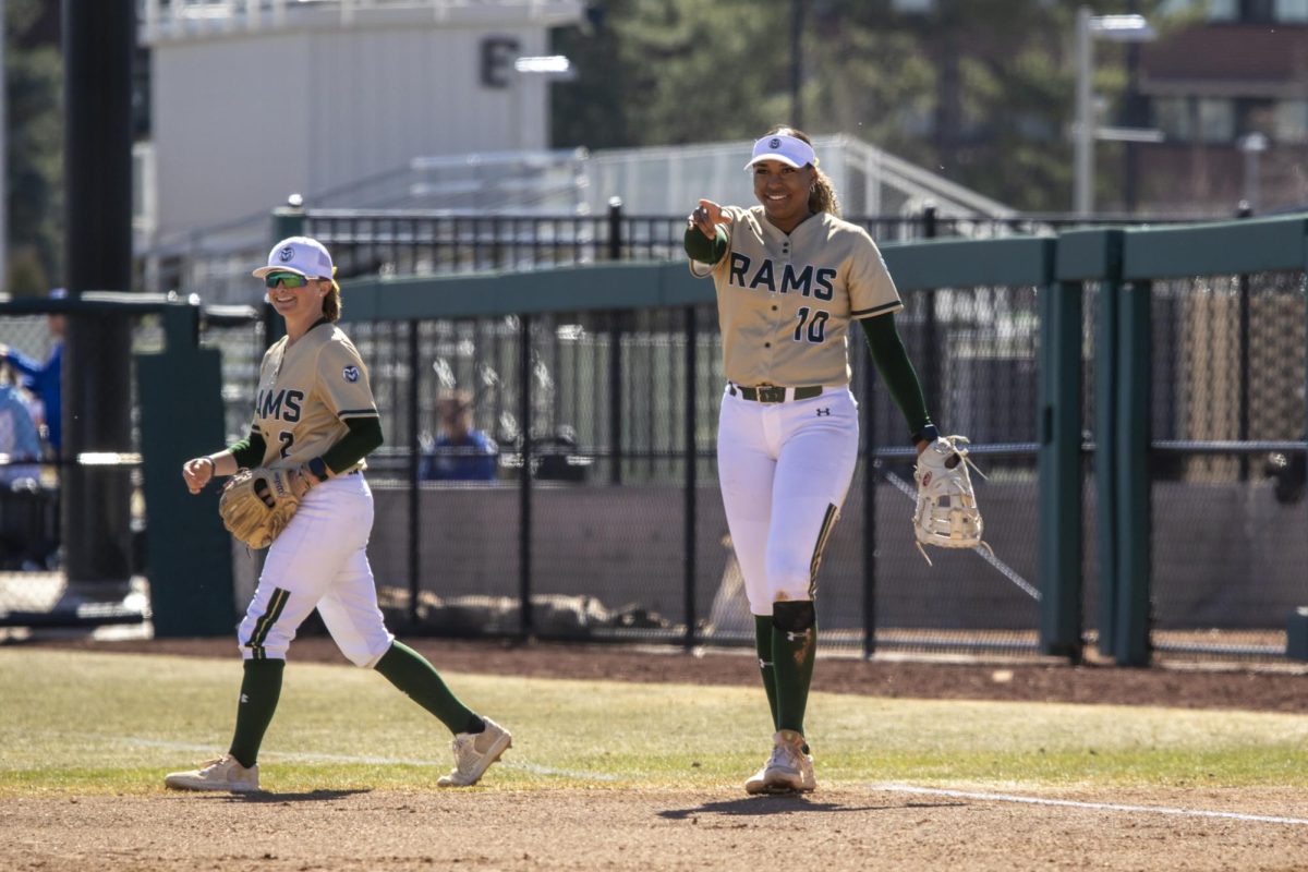 Jailey Wilson (10) and Jac Smith (2) celebrate an out during Colorado State University’s game against South Dakota State March 8. The Rams secured an 8-0 shutout in five innings at the CSU Softball Field.