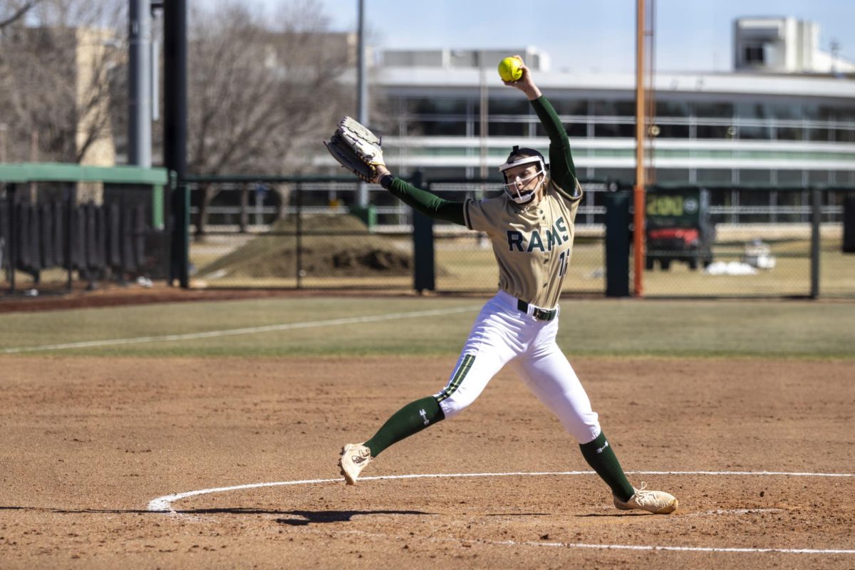 Regan Wick (12) throws a pitch during Colorado State University’s game against South Dakota State March 8. The Rams secured an 8-0 shutout in five innings at the CSU Softball Field.