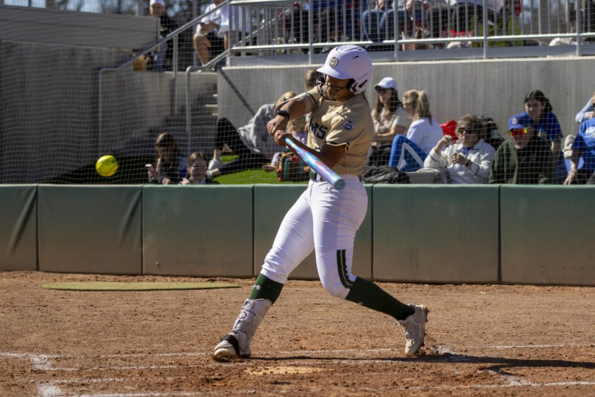 Clarissa Castillo (21) hits the ball during Colorado State University’s game against South Dakota State March 8. The Rams secured an 8-0 shutout in five innings at the CSU Softball Field.