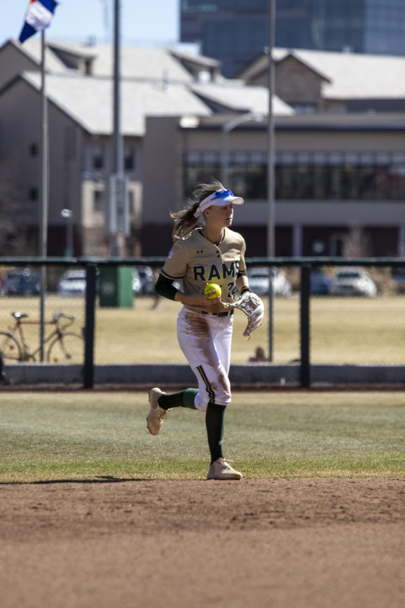 Kaylynn English (28) runs the ball to the circle after it was hit to outfeld during Colorado State University’s game against South Dakota State March 8. The Rams secured an 8-0 shutout in five innings at the CSU Softball Field.