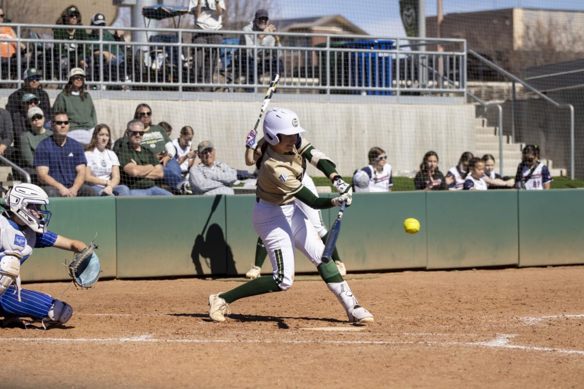 A Colorado State player hits the ball during the game against South Dakota State on March 8. The Rams secured an 8-0 shutout in five innings at the CSU Softball Field.
