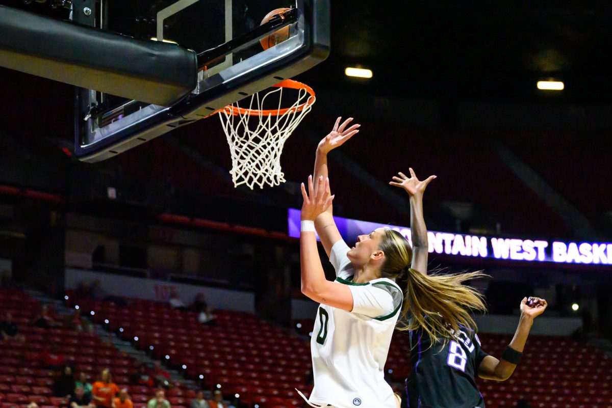 Colorado State University women's basketball forward Madelyn Bragg (0) throws the ball up into the hoop during CSU's opening game in the Mountain West tournament against Grand Canyon University March 8. Bragg scored the game-winning lay up.