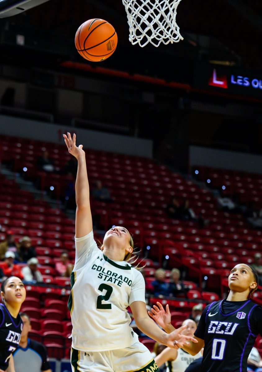 Colorado State University women's basketball guard Brooke Carlson (2) struggles through Grand Canyon University's defense to make a layup during CSU's game against GCU in the Mountain West tournament March 8. 