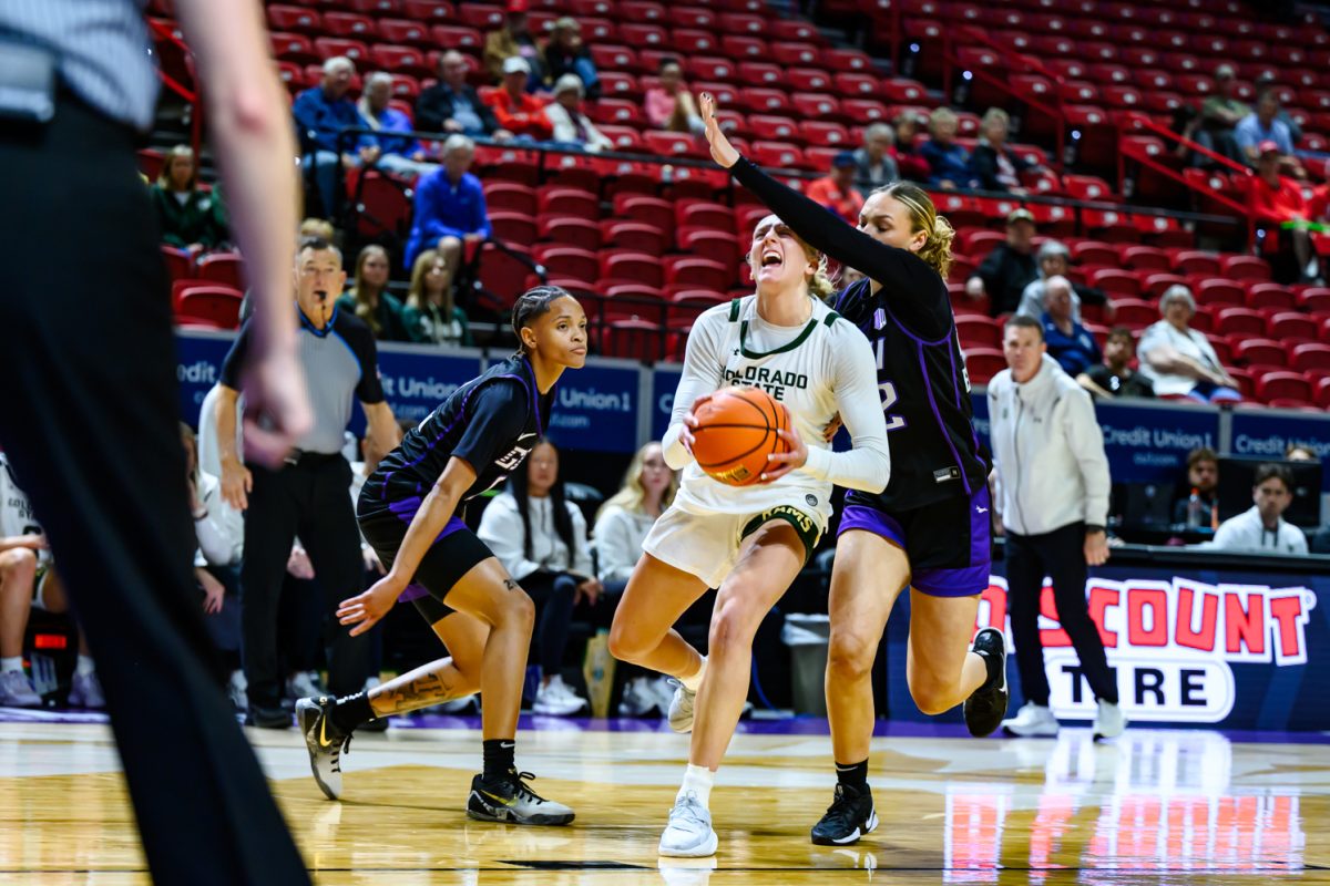 Colorado State University women's basketball guard Lexus Bargesser (3) pushes through Grand Canyon Univesrity's defense during CSU's game against GCU in the Mountain West tournament March 8. CSU played GCU in their opening game in the Mountain West tournament, winning 61-59. Bargesser was the highest scorer for the Rams, putting up 19 points during the game. 