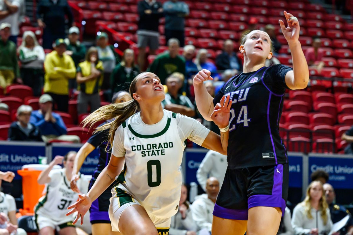 Colorado State University women's basketball forward Madelyn Bragg (0) and Grand Canyon University forward Norah Moo (24) watch to see if Bragg's shot makes it into the basket during CSU's game against GCU in the Mountain West tournament March 8. Bragg's shot won the game for the Rams 61-59.