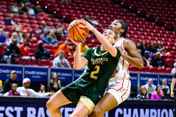 Colorado State University women's basketball guard Brooke Carlson (2) struggles to make a shot while facing pressure from University of Nevada Las Vegas defense during CSU's game against UNLV in the Mountain West tournament March 9. Carlson put 19 points on the board for the Rams, making her CSU's highest scorer of the game.