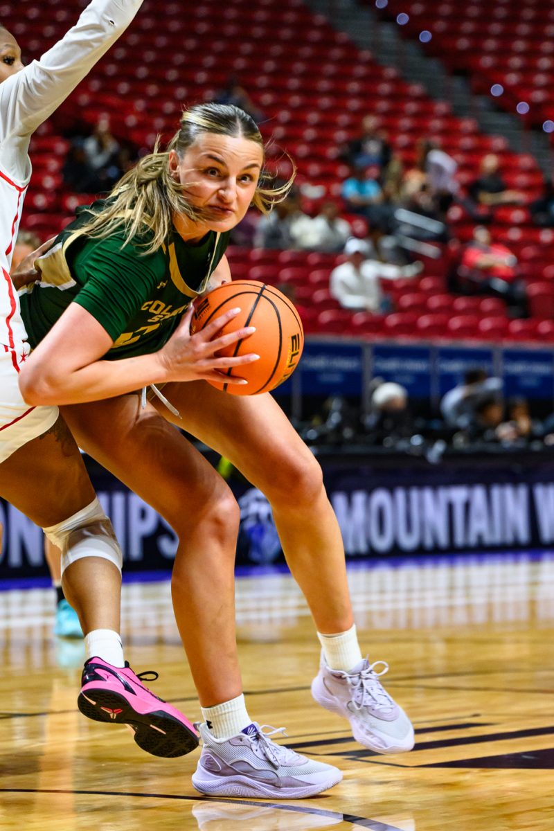 Colorado State University women's basketball forward Madelyn Bragg (0) pushes thorugh a University of Nevada Las Vegas defender during CSU's game against UNLV in the Mountain West tournament March 9.