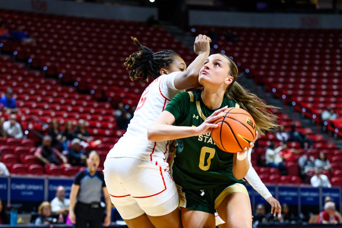 Colorado State University women's basketball forward Madelyn Bragg (0) pushes thorugh a University of Nevada Las Vegas defender during CSU's game against UNLV in the Mountain West tournament March 9.