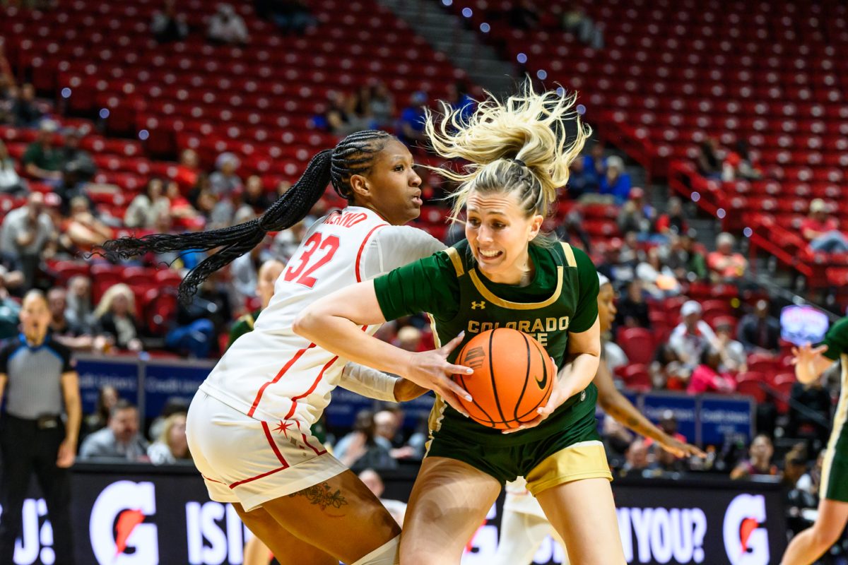Colorado State University women's basketball forward Lexi Deden (6) pushes through University of Nevada Las Vegas forward Meadow Roland (32) during CSU's game against UNLV in the Mountain West semifinals March 9.