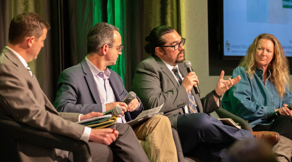 Panel moderator Matthew Hitt and panelists Seth Masket and Kristin Olofsson listen to the response Anand Edward Sokhey gives to a question March 10. The question from Hitt asked what the panelists hope the state of democracy is in five years. “I would hope that in five years I’m not asking these questions about threats to the First Amendment and holding my breath, trying to see if people are responding to the political developments.”