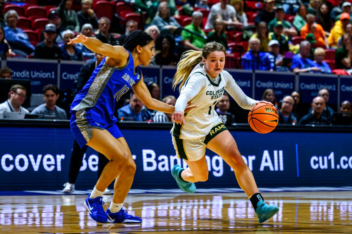 Colorado State University women's basketball guard Kloe Froebe (1) dribbles around Air Force Academy guard Jayda McNabb (10) during CSU's game against AFA in the Mountain West tournament finals March 10. 