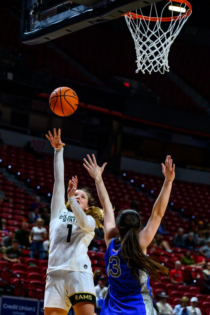 Colorado State University women's basketball guard Kloe Froebe (1) throws the ball to the hoop during CSU's game against Air Force Academy in the Mountain West tournament March 10. Froebe scored nine points for the Rams.