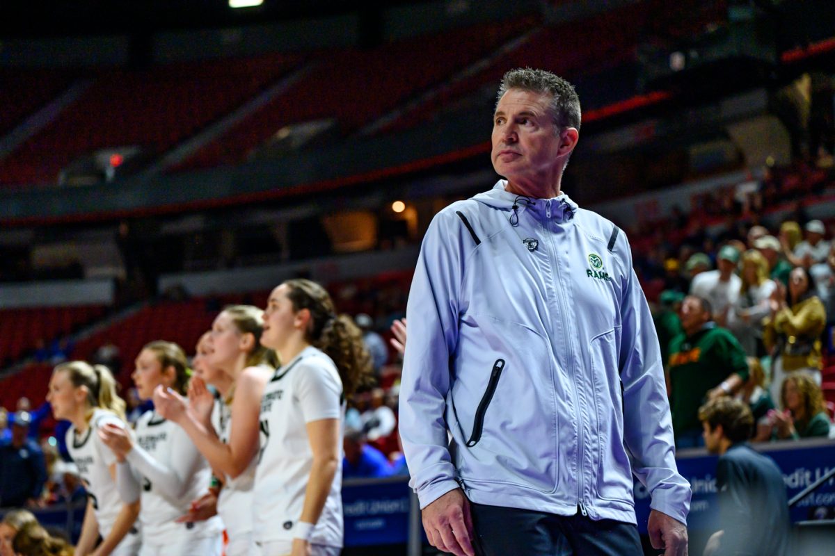 Colorado State University women's basketball head coach Ryun Williams watches Brooke Carlson (2) push to the basket during CSU's game against Air Force Academy in the final round of the Mountain West tournament March 10. 