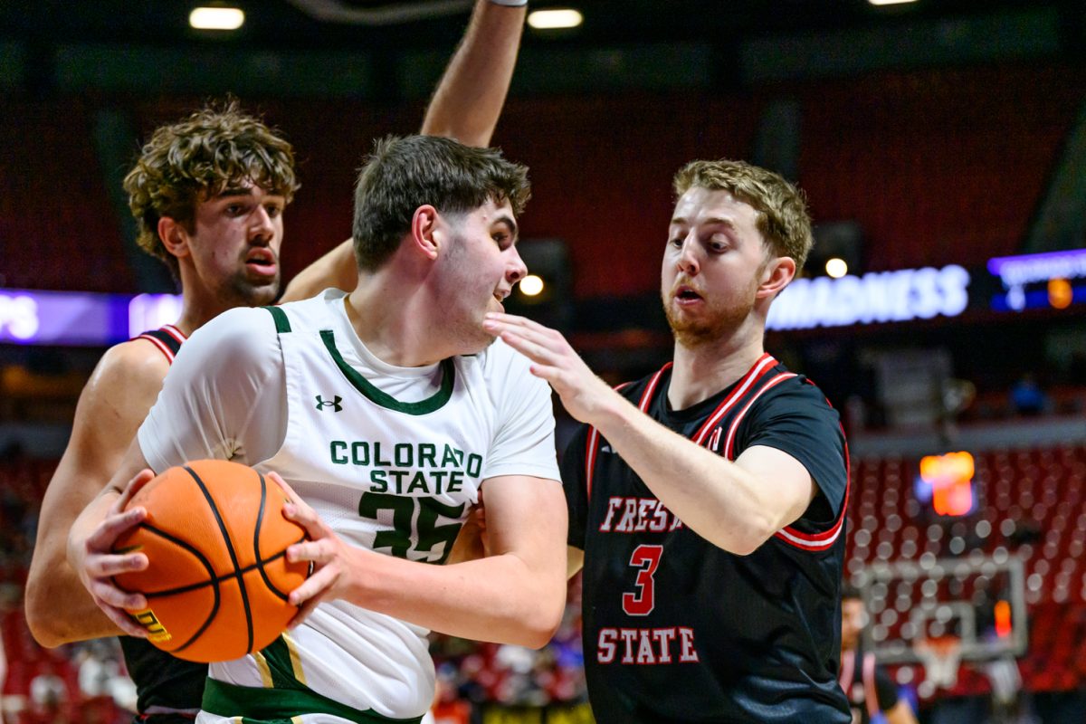 Colorado State University men's basketball guard Kyle Jorgensen (35) looks for a pass during CSU's game against Fresno State University in the Mountain West tournament March 11. 