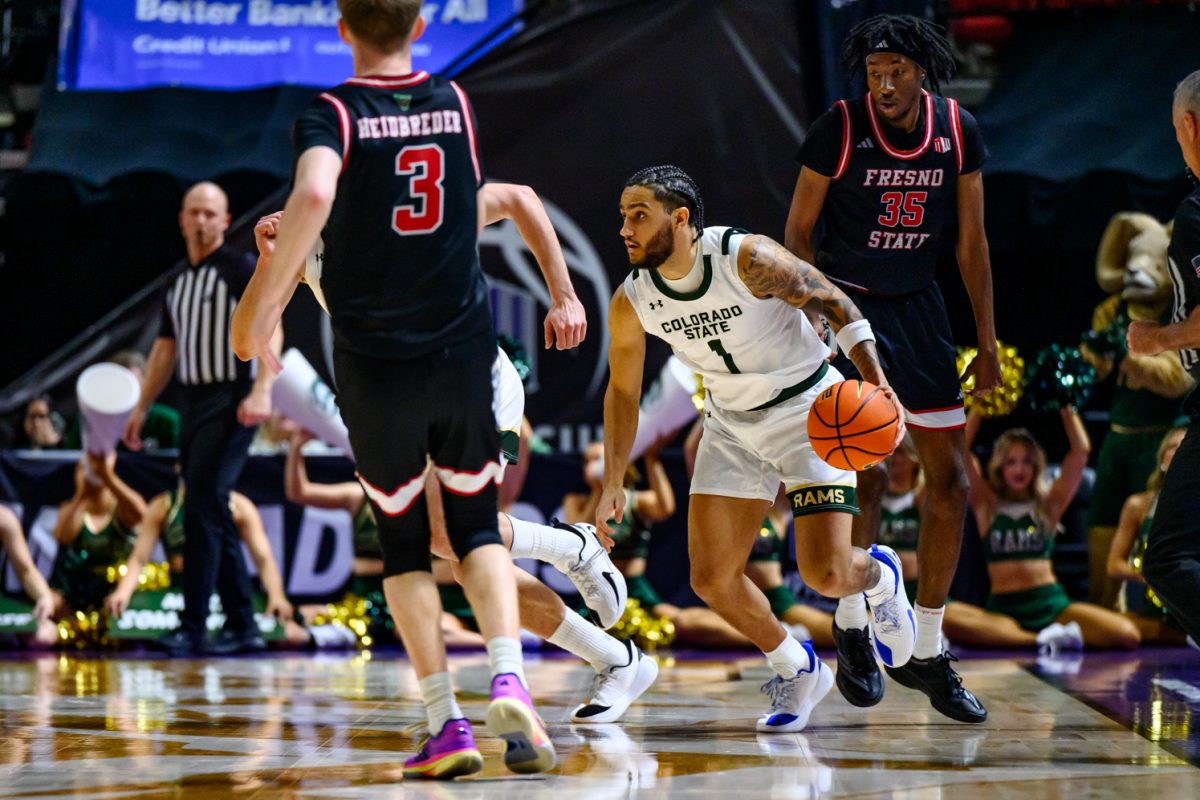 Colorado State University men's basketball guard Josh Pascarelli (1) looks for a teammate during CSU's game against Fresno State University in the Mountain West tournament March 11. 
