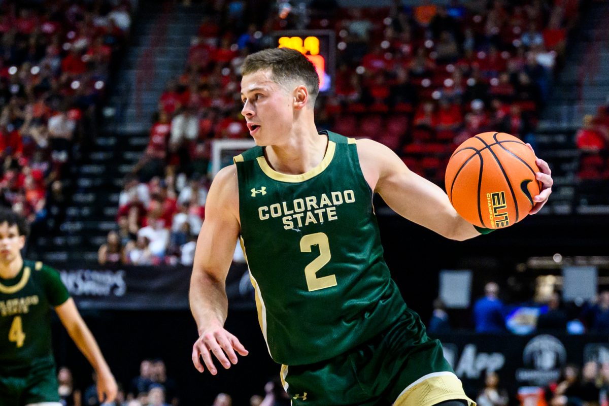 Colorado State University men's basketball guard Brandon Rechsteiner (2) looks for a teammate to pass to during CSU's Mountain West tournament game against San Diego State University March 12. Rechsteiner put up 16 points for the Rams, making him the team's highest scorer of the game. 