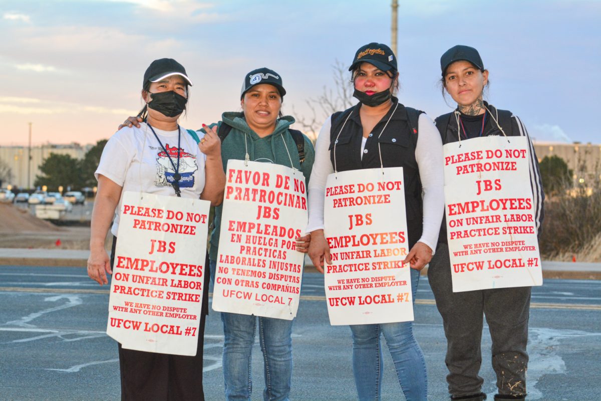 Maria Lomeli, Maria Andres, Nurzee Manu and another protestor who requested anonymity posing outside of JBS joining the two weeklong strike against the meat packing plant demanding fair treatment and better working conditions March 25. " We are fighting for equal rights for everybody here. It doesn't matter where you're from or what language you speak, I think everybody deserves the same kind of like options and the same rights as anybody" Maria Lomeli states " It's not right if your exploited to get an income for your family, we deserve more than what they're giving us"