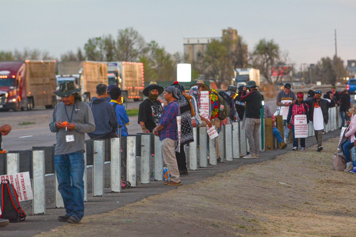 JBS employees gather as a part of the massive strike in front of the huge meat packing plant in Greeley, CO March 25. This strike was organized to bring attention to the unsafe increased production and cut to the employee's hours. 